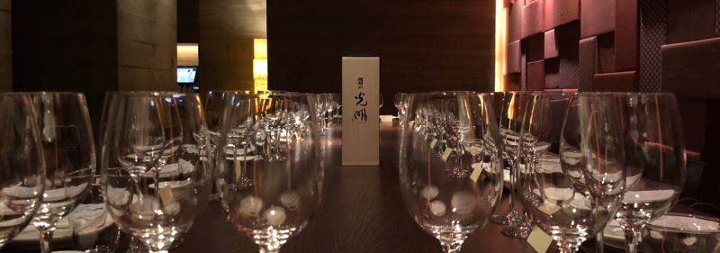 Tatenokawa's Komyo 1% polished sake placed on a table at London' ROKA restaurant